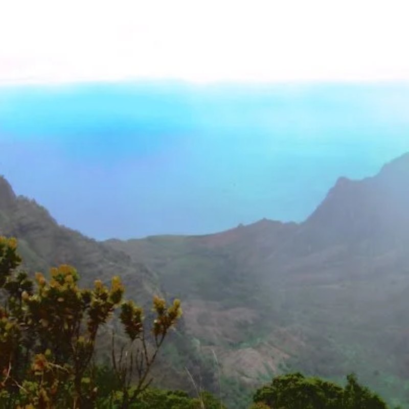 Misty blue mountains above a valley